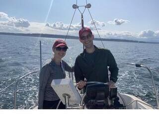 Two fellows on a boat