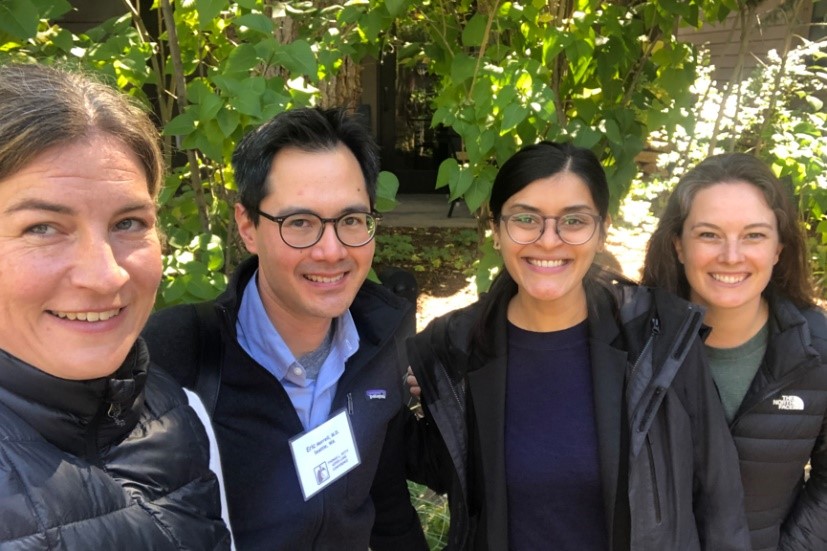 Group of 4 people as described in the caption